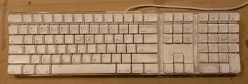 The victim, a dirty Apple A1048 keyboard.
