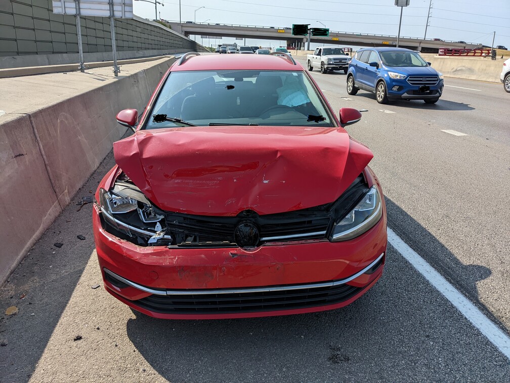 Red 2019 Golf Sportwagen
            totaled